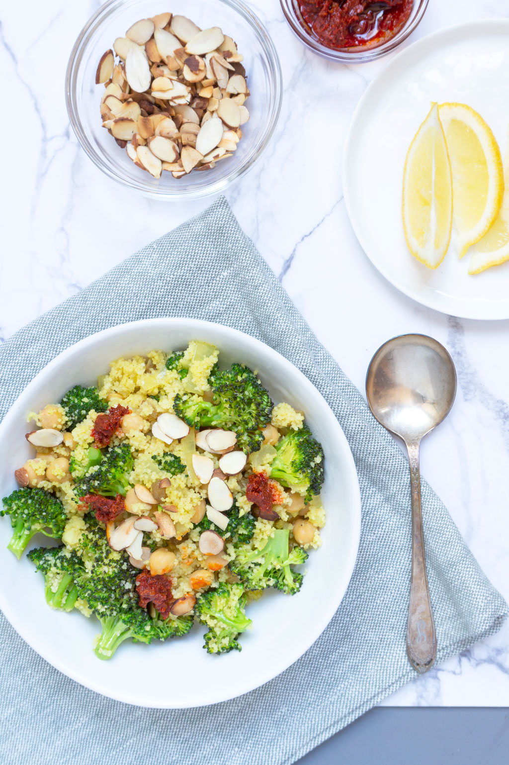 Vegan Broccoli Salad with Couscous, Raisins + Almonds - Oat&Sesame